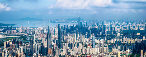 High angle view of city buildings skyline and mountains in Shenzhen