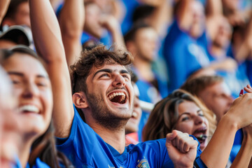 Italian football soccer fans in a stadium supporting the national team, Squadra Azzurra
