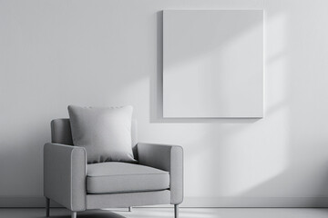 An elegant minimalistic interior with a cozy gray armchair and a white blank painting on the wall for a mockup in a bright room