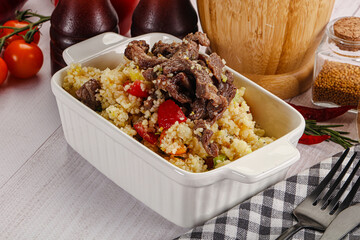 Traditional couscous with beef and vegetables