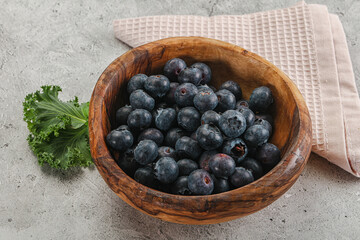 Sweet ripe blueberry on the bowl