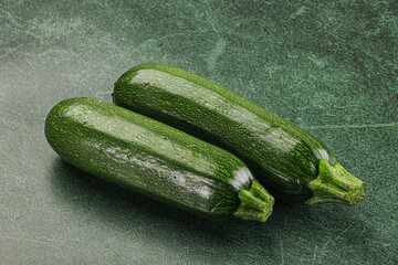 Raw green ripe zucchini vegetable