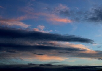 Fototapeta na wymiar Clouds at sunset, winter sky