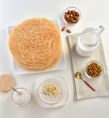 Pheni, fried vermicelli is a cereal made by wheat flour and Desi Ghee. Serve with milk, sugar and...