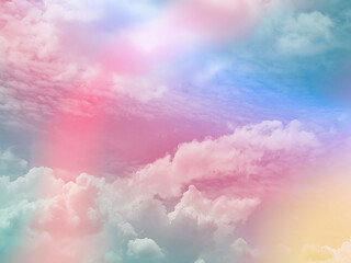 beauty sweet pastel pink and yellow colorful with fluffy clouds on sky. multi color rainbow image....