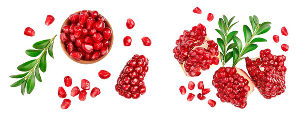 pomegranate seeds in wooden bowl isolated on white background with full depth of field. Top view....