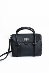 Women's black leather bag  on a white background