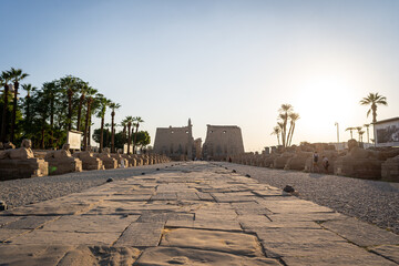 Luxor, Egypt - October 27, 2022. Views of the Avenue of the Rams and the entrance to the archeological complex of the Luxor Temple. - 754408496