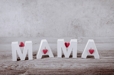 Mama card with hearts in white letters as a greetings card for Mother's Day - 754423452