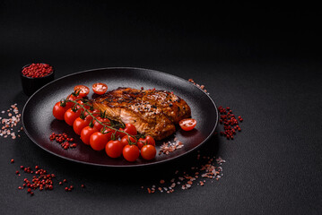 Delicious red salmon fish grilled with sauce and sesame, spices and herbs