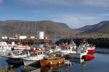 Scenic view of boats at Þingeyri (Thingeyri) harbor in Westfjords, Iceland, in summer