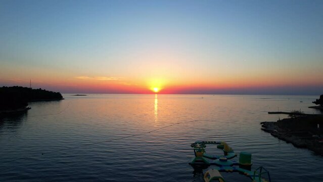 Porec - Croatia - Aerial view from the beach of the open sea of the Adriatic in the dreamy sunset