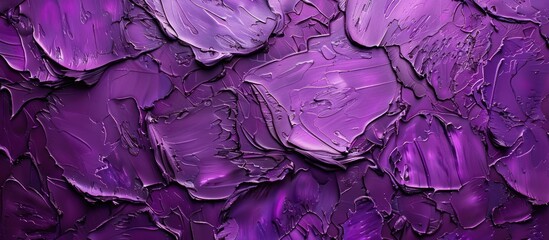 Obraz premium A close-up view of a wall covered in rich purple paint, highlighting the vibrant color against the textured surface.