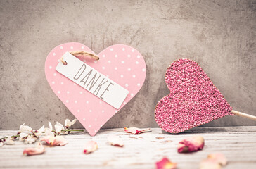 pink hearts on wooden background with thank you text - 754461891