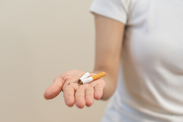 Quit, stop smoking, addiction asian young woman, girl refusing cigarette, smoker quitting smoke, hand in broken, break tobacco. Quit bad habit, health care concept. Willpower lifestyle of people.