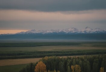 landscape with mountains, forest and a river in front. beautiful scenery