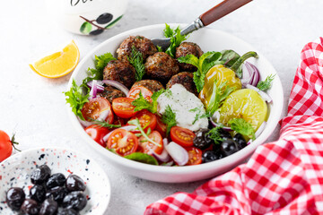 Greek meatballs with tzatziki sauce.