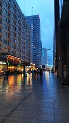 Warsaw street, the capital of Poland, modern life, street photo, rain, evening, early spring, fog,...