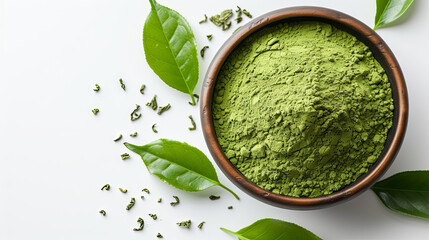 Green tea powder made from matcha, presented in a bowl with fresh green leaves, set against a white backdrop