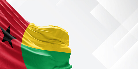 Guinea-Bissau national flag cloth fabric waving on beautiful white Background.