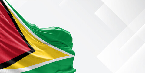 Guyana national flag cloth fabric waving on beautiful white Background.