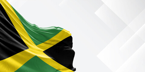 Jamaica national flag cloth fabric waving on beautiful white Background.