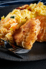 Fried cod fillet served.