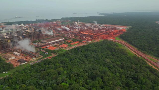 Aerial view of an alumina refinery and its waste depot in Barcarena, Para state, Brazil. Alumina is the raw material for aluminum and is produced from bauxite ore.