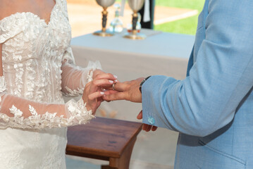 Close up of wedding ring, A wedding ring is a finger ring typically worn at the base of the left...