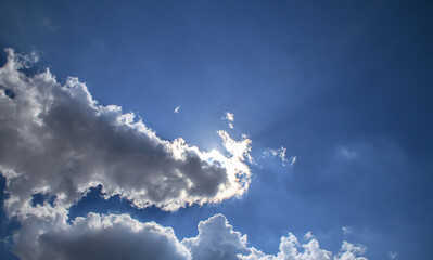clouds blue sky sun ray