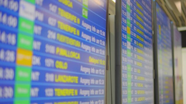 Airport flight information display system with departure details in 4k slow motion 120fps