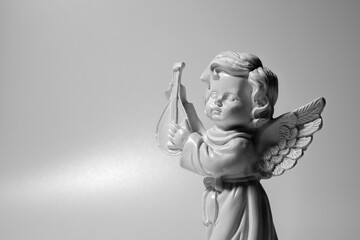 Death concept. Little beautiful angel crying as symbol of pain, fear and end of human life.