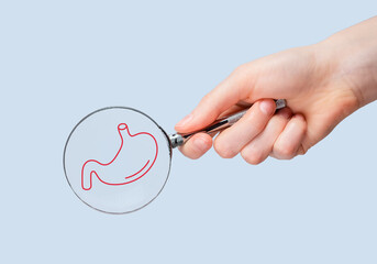 Stomach health checkup, study through magnifying glass