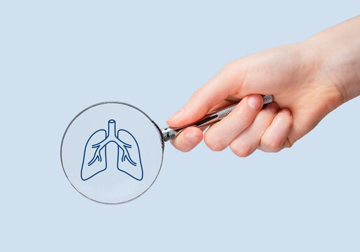 Lungs health checkup, study through magnifying glass