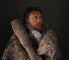 Portrait of a dirty caveman man