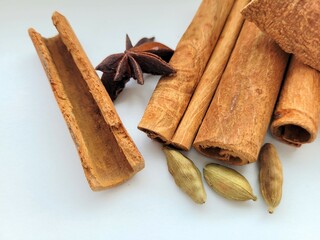 Cinnamon sticks, anise and cardamom.