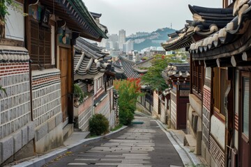 Contrasting Cityscape of Old and New Seoul. Bukchon Hanok Village Brings Traditional Korean Architecture to the Modern Metropolis