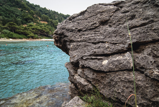 Rocky Ionian Sea shore near Sinarades village on Corfu Island, Greece