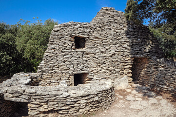 Fototapeta na wymiar Drystones hut in Village des Bories open air museum near Gordes village in Provence region of France