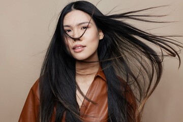 Woman fashion asian salon hair cosmetic glamour beautiful portrait beauty femininity model beige