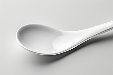 New spoon. Background with selective focus and copy space
