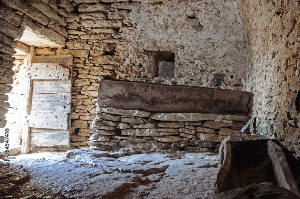 Canvas Prints Interior of historic cottage in village des Bories open air museum near Gordes village in Provence region of France