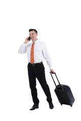 Handsome steward with suitcase talking by mobile phone on white background