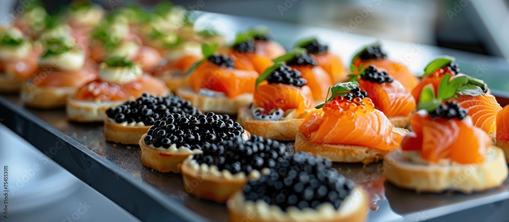 Poster detailed view of a tray filled with various food items placed on a table.