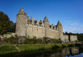 Fototapeta na wymiar The chateau or castle in Josselin, Brittany, France, built in the middle ages, on the edge of Oust River.
