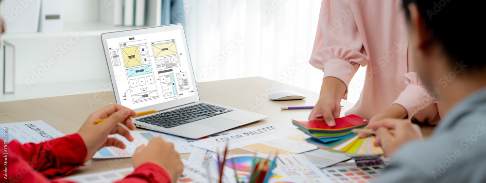 Aufkleber cropped image of interior designer team discuss the material color while laptop displayed website wi