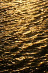 golden reflection on water surface