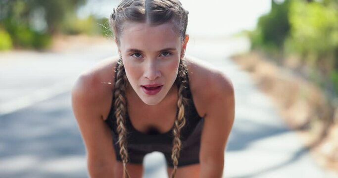 Woman, breathe or tired in road with exercise for wellness, break or body fatigue with fitness in nature. Runner, athlete or portrait with relax for workout, running or training in street with cardio
