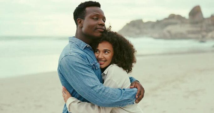 Love, hug and couple at beach on holiday, vacation or travel for romantic date together. Nature, island and interracial young man and woman embracing by ocean or sea on tropical weekend trip.
