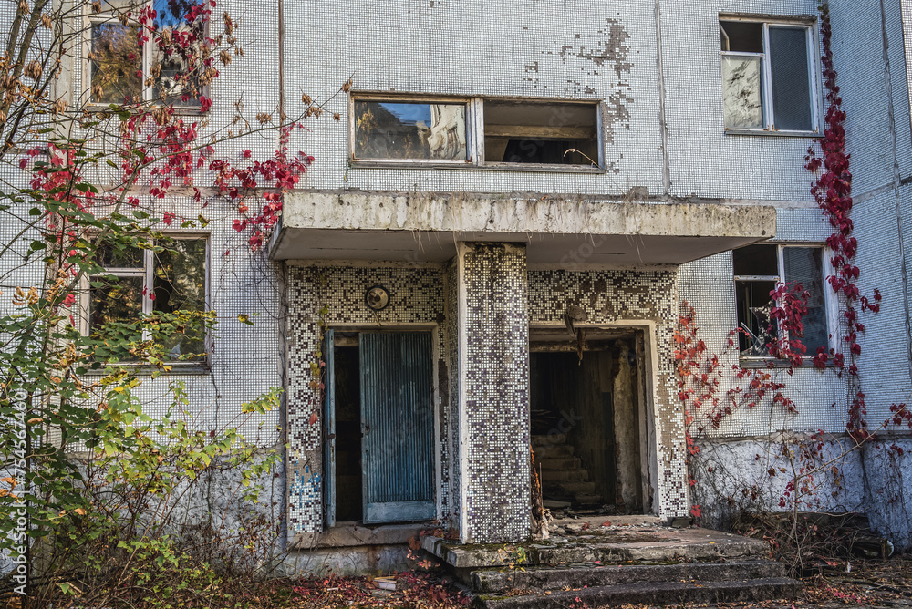 Wall mural Entrance to abandoned residential building in Pripyat ghost city in Chernobyl Exclusion Zone, Ukraine